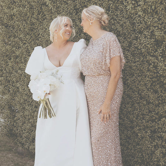 Bride with Mother wearing pink hand beaded gown