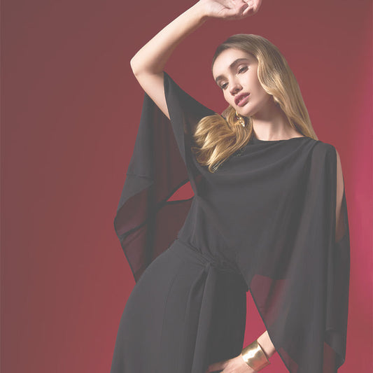 Model with arms up wearing chiffon top