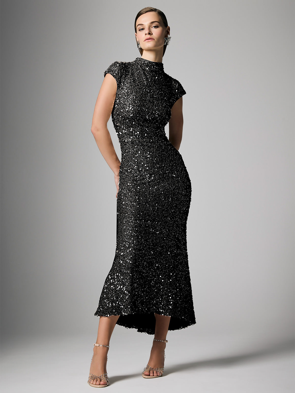 black tie sequin dresses Velvi - Emma Mini Dress - Ruched Homecoming Dress - Lady Black Ties Eclipse gown in black is a stunning sequin gown that features a v neckline with a criss cross ruching detail on the bodice Zahra Black Sequin Dress